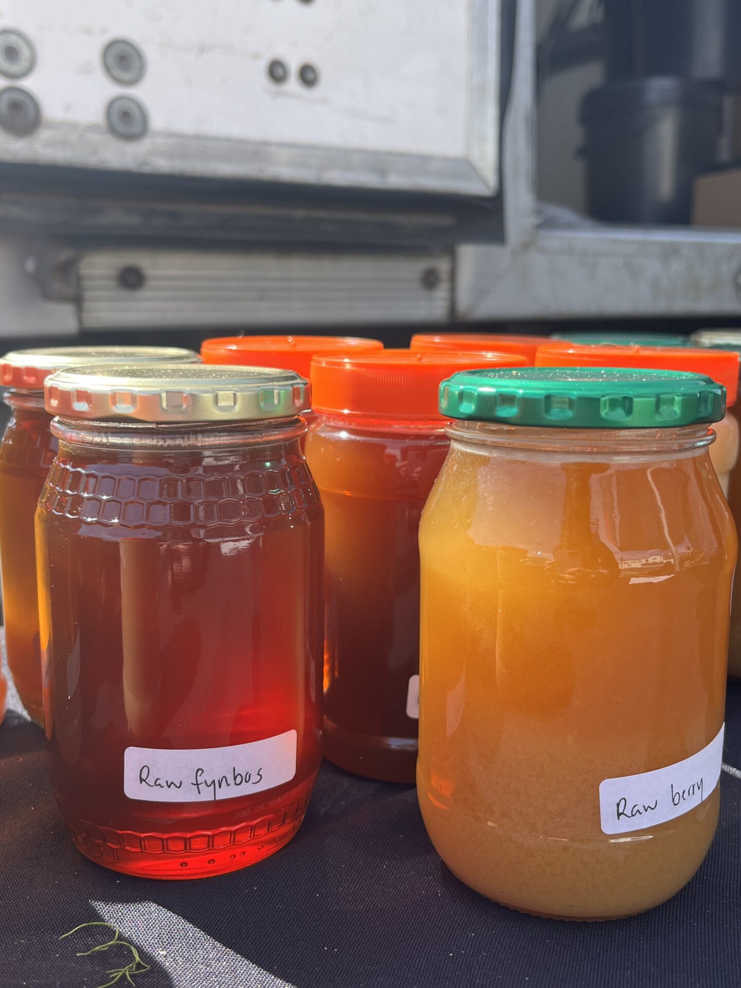 This Fynbos Honey is sourced from farmers on the western edge of the Cape Floristic Region. Bees play a vital role in pollinating many fynbos species, especially those in the Erica genus. The honey itself is rich and floral, with a complex flavour layered with hints of caramel and herbs, and a deep amber colour. Celebrated as one of the country’s most popular honeys, it’s a versatile culinary ingredient and a naturally delicious sweetener.